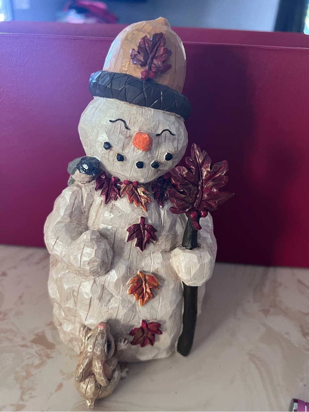 Christopher Radko Cream Snowman Figurine with Red and Orange Leaf Accents